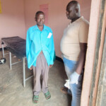 Patient with one of the two doctors Uganda Missions 2024